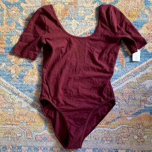 Like New AMERICAN APPAREL body suit -Marion Size M